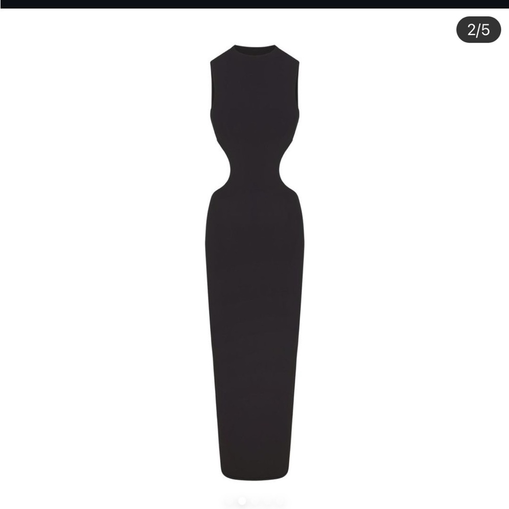 Worn only one time SKIMS fits everybody cut out open back long dress